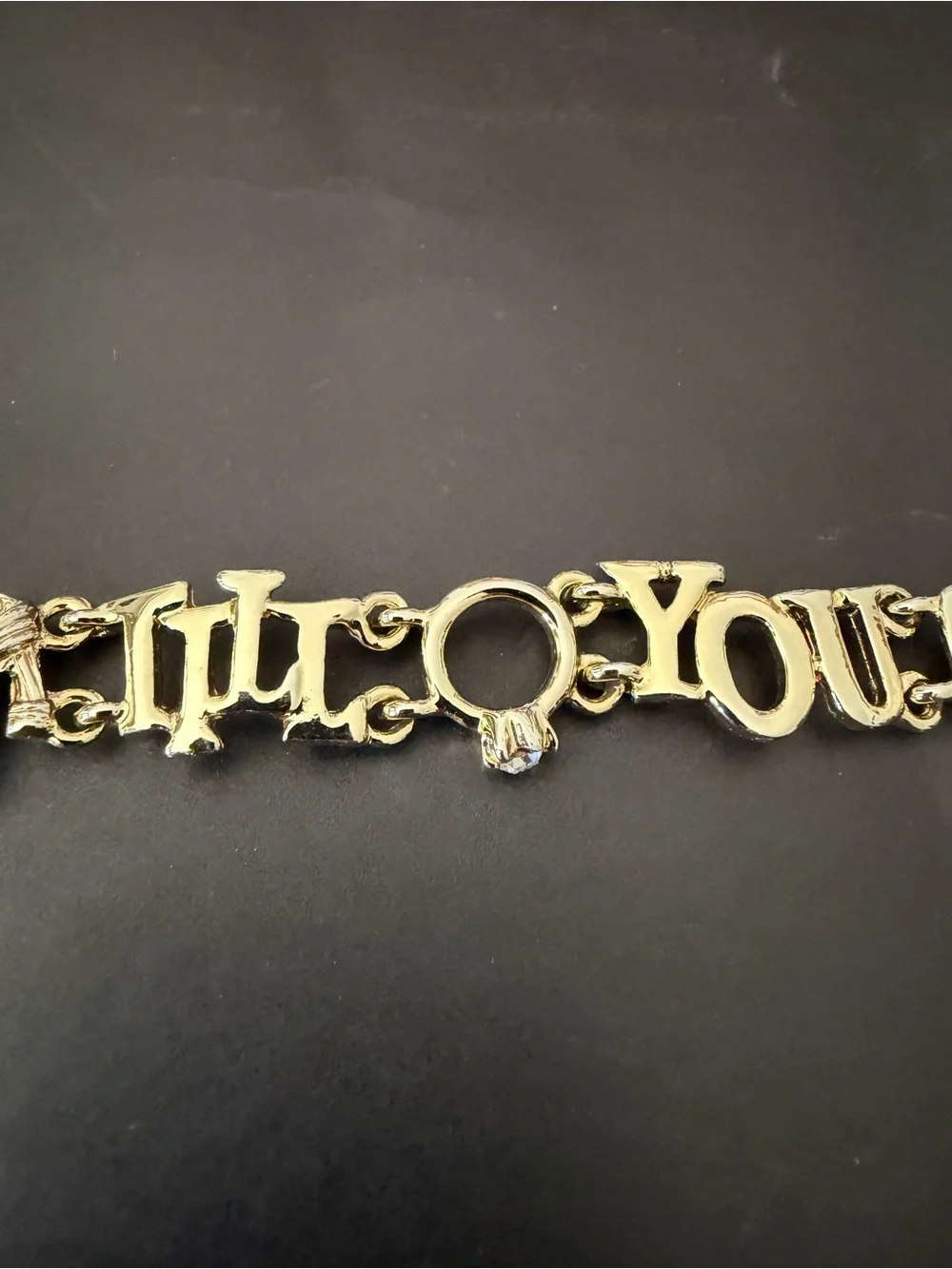 Gold Tone 'Shop Til You Drop' Charm Bracelet